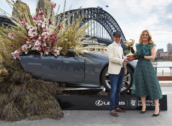 Lexus Brand Ambassadors Corey Brown and Emma Freedman with the Melbourne Cup