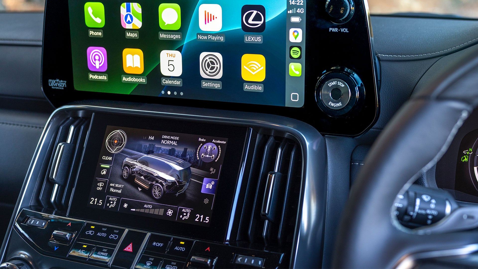 The interior of a Lexus LX 500d Overtrail showing the infotainment and climate controls